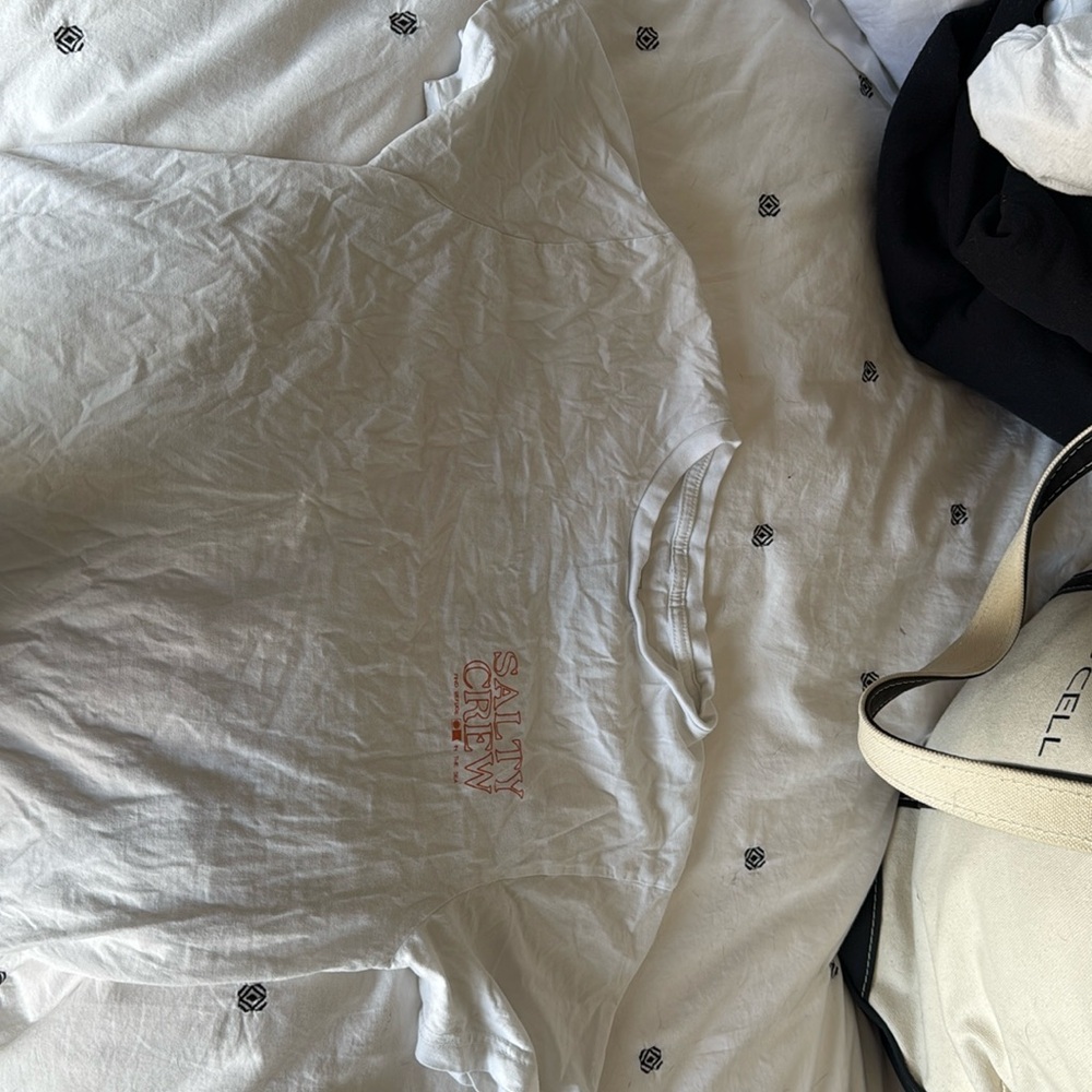 This is a white salty crew shirt
